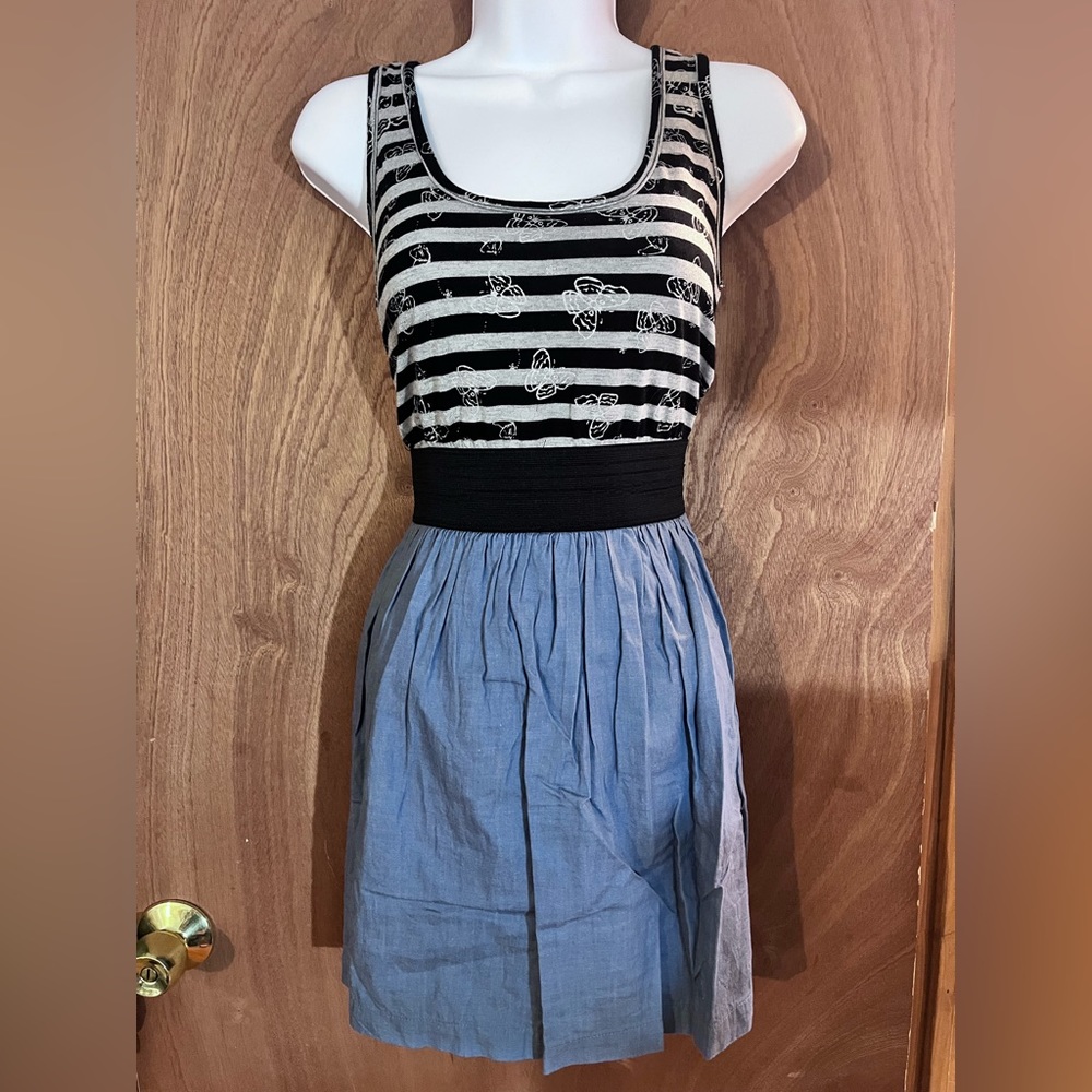 Junior women’s summer sundress with butterfly’s. Size medium.